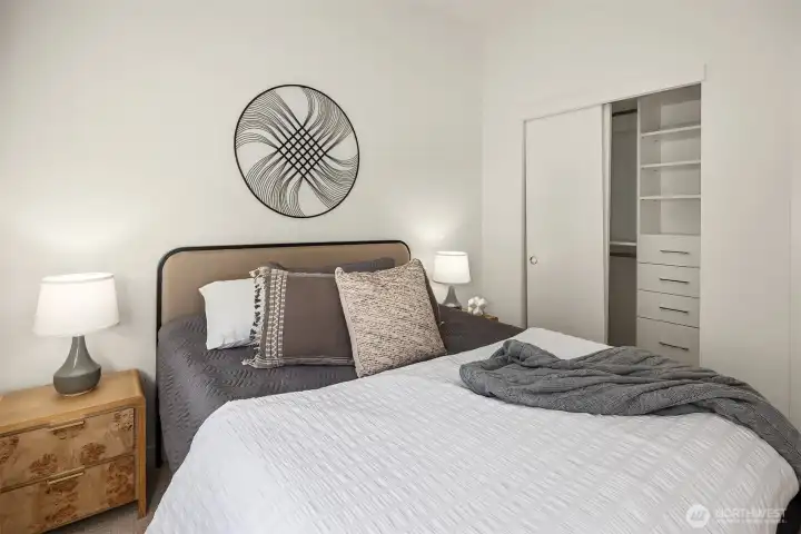 The second bedroom has a custom closet system as well.