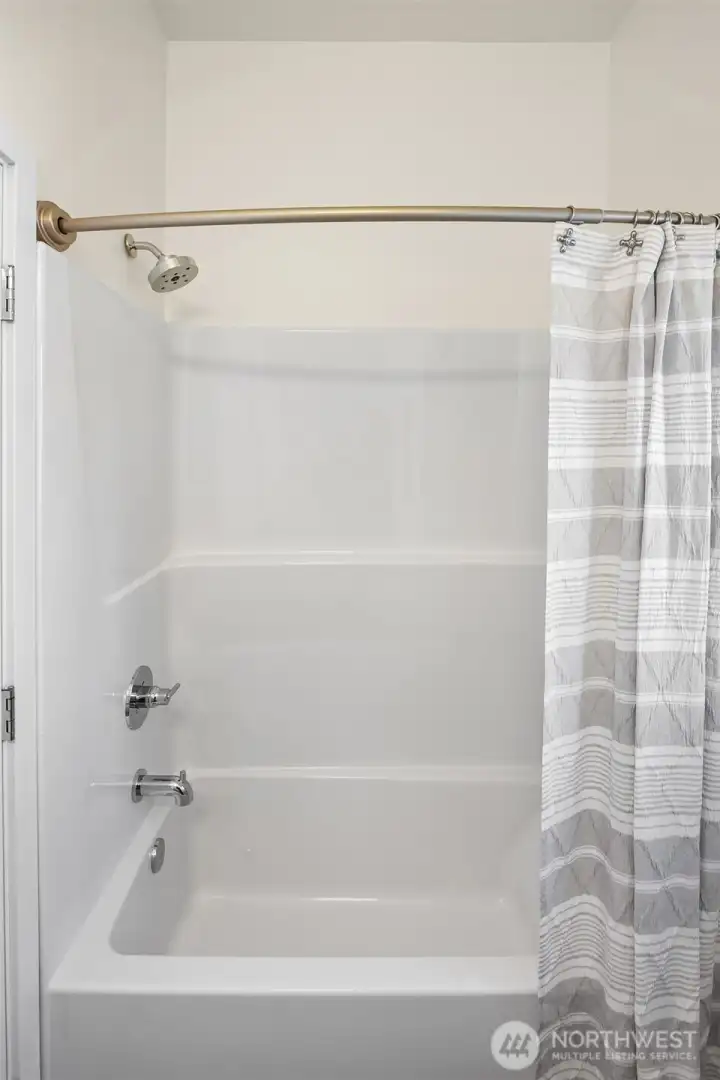 Shower and tub in second bath.