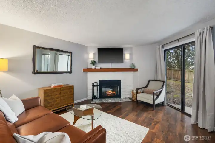 Living room with wood burning fireplace