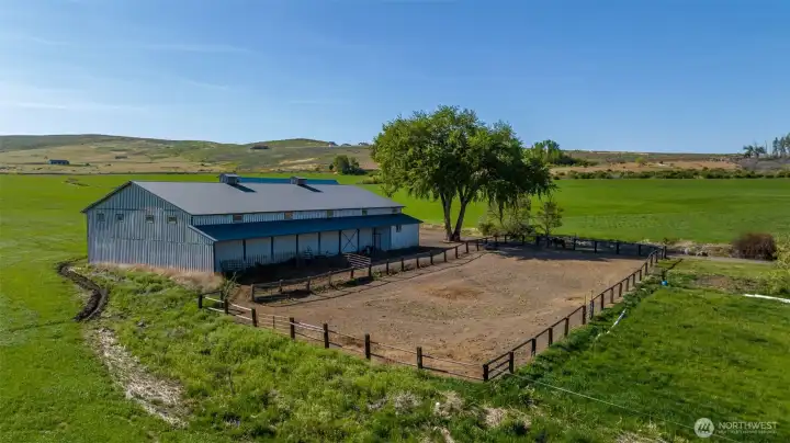 Exterior of the indoor arena and paddock. Room for 4 additional stalls. Indoor arena measures 70' x 120'.