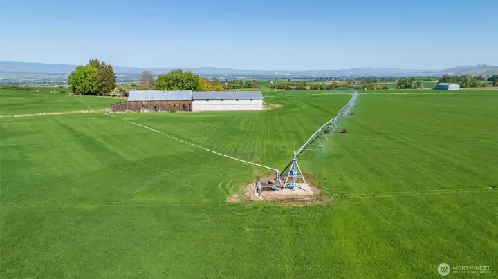 View of the center pivot irrigation system, a key feature supporting the productivity of this 158+ acre property. Included in the sale is approximately 1 mile of 8” and 10” irrigation piping, adding significant value and efficiency for farming, hay production, or agricultural investment opportunities.