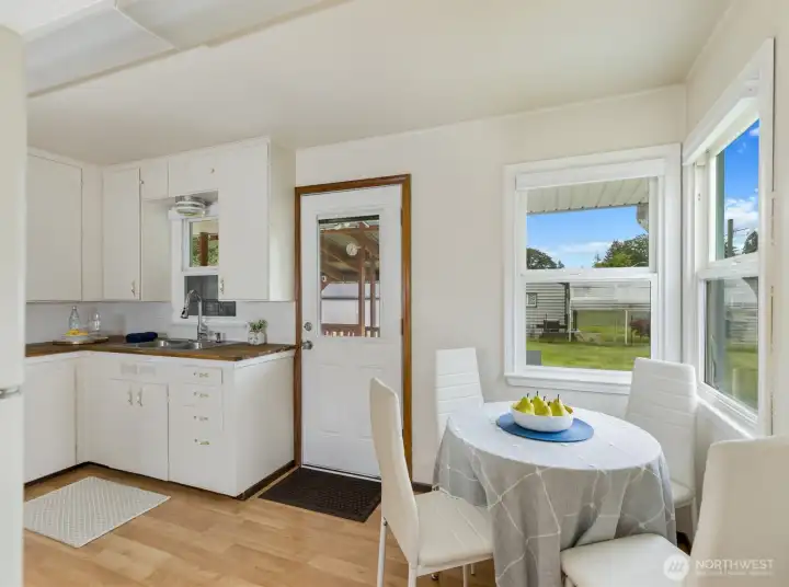 Lovely corner featuring new double windows to look out into backyard
