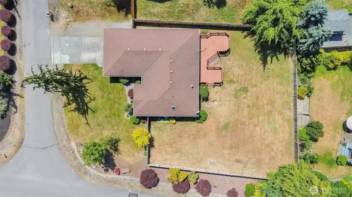 Set on 0.35 of an acre with a fully fenced backyard.
