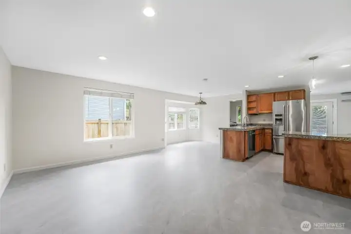 Spacious and bright kitchen and dining areas.