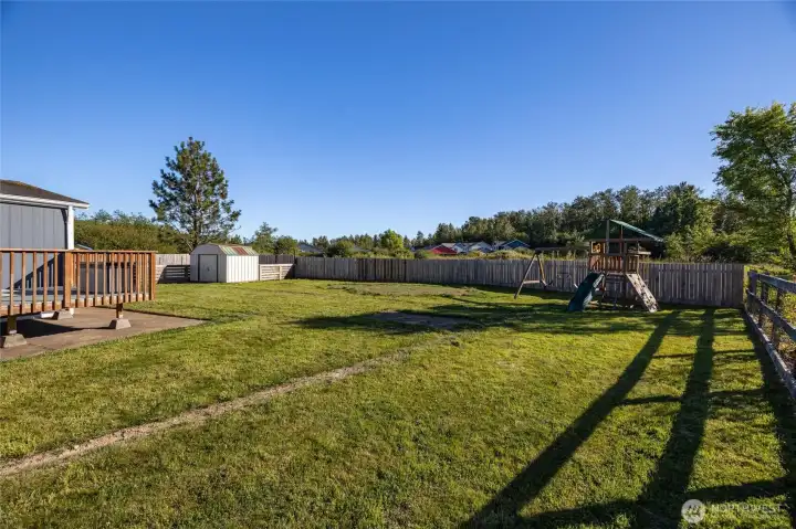 Home overlooks undeveloped grassy area