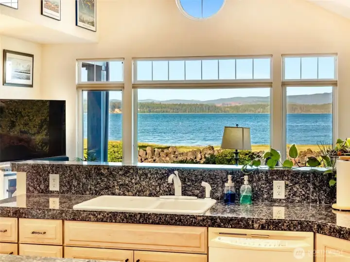 Kitchen sink perfectly positioned to capture sweeping bay views while preparing meals.