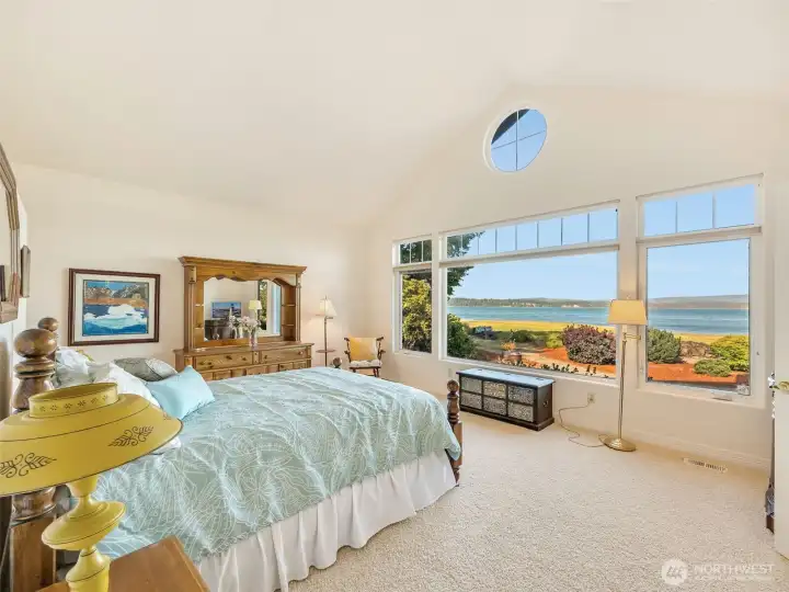 Wake up to sweeping bay views from the comfort of the primary bedroom.