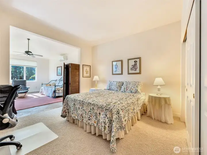 Guest bedroom offering flexible space for family, guests, or a home office.