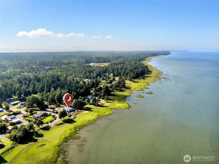 Spectacular aerial view showcasing the property's waterfront location along Willapa Bay.