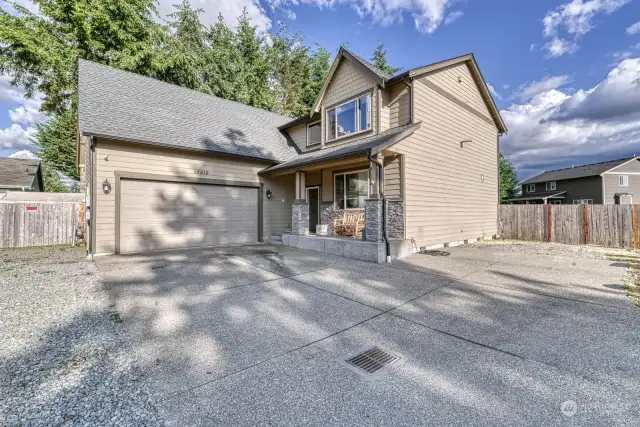 Welcome Home! Large driveway with gated entry leads you to the home.