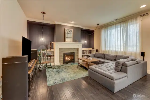 Living Room with Gas Fireplace and hardwood flooring.