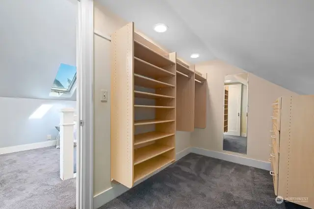 Huge walk-in closet with two sides.