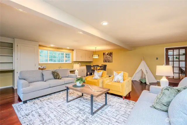 Love the engineered hardwood floors, recessed lighting and French doors to the expansive back deck!