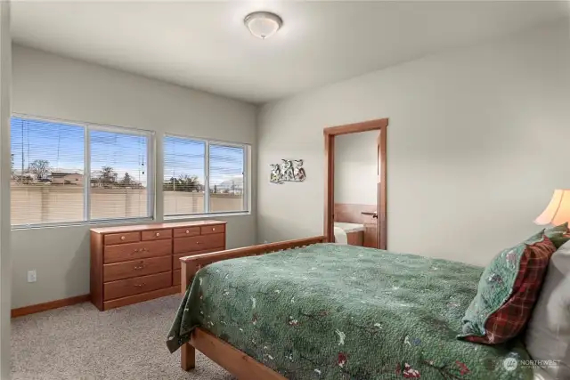 Primary Suite #1 is located on the east end of the home, is very spacious and has a peek-a-boo Lake Chelan view.