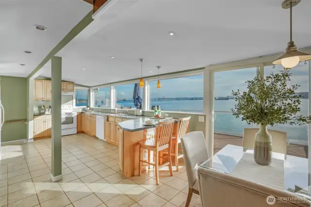 Expansive picture windows flood the home with natural light.