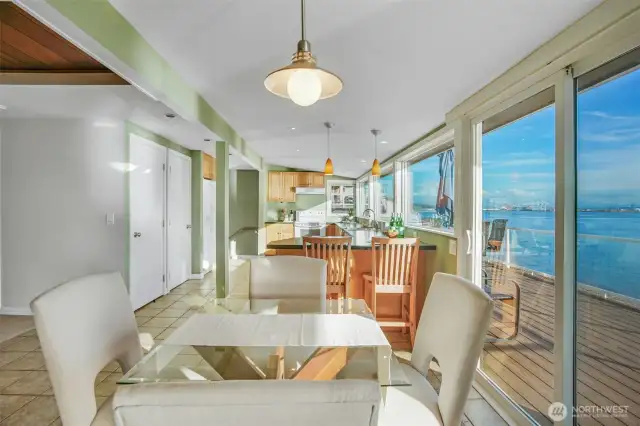 Dining room looking into the kitchen. To the right is the access to the view deck.