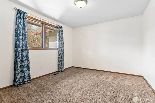2nd bedroom on main floor, just off front entry