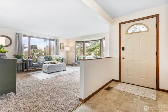 Sunny & bright living room just off main entry