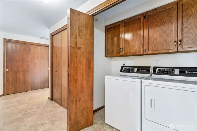 Front entry around hall corner, tons of closets & storage, plus w/d conveniently central to bedrooms