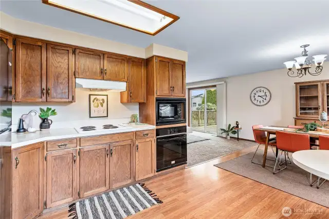 Just off kitchen/dining leads to family room w/access to backyard