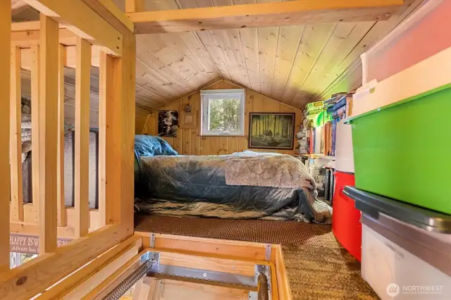 Bedroom in the kitchen loft.