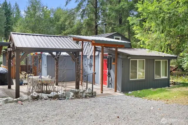 Approach the property and enter the covered dining area. Enjoy meals al fresco.