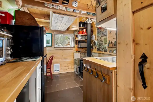 Kitchen ahead, half bath to the right.