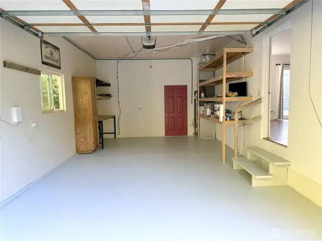 Single car garage with storage areas