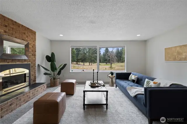 Large Windows look out at Golf Course