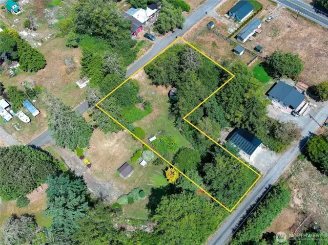 4 50' x 100' tax parcels, 3 fronting on W Cedar and the other goes to Fir.