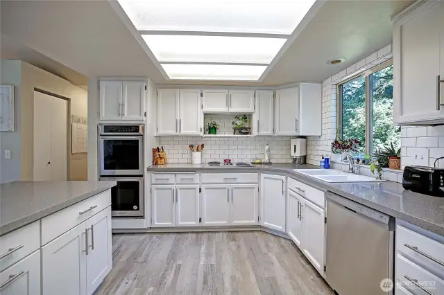 Recently remodeled kitchen, open to great room.  Quartz counters, shaker cabinets, stainless steel appliances.