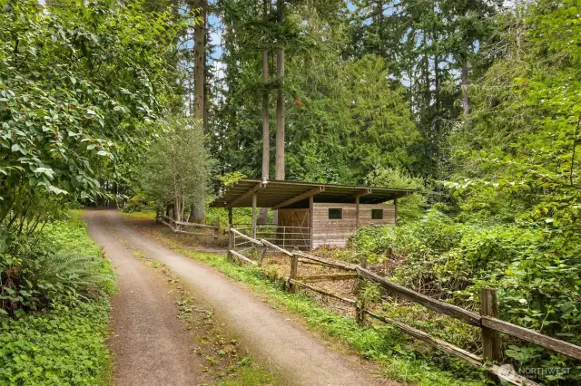 You enter the property via the second tax parcel which includes this shop/barn. Very useful as bonus storage.