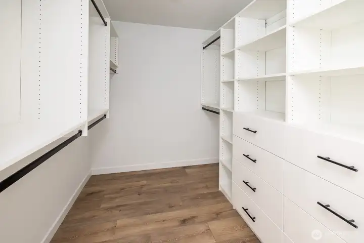 Primary bedroom walk in closet system has been added for your convenience!