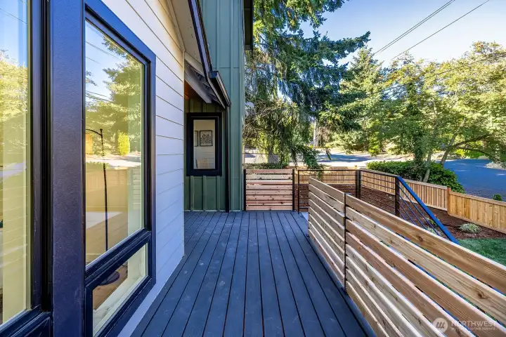 Another view of the front porch deck space.  Very private and serene views and a quiet place to overlook your generous front yard.