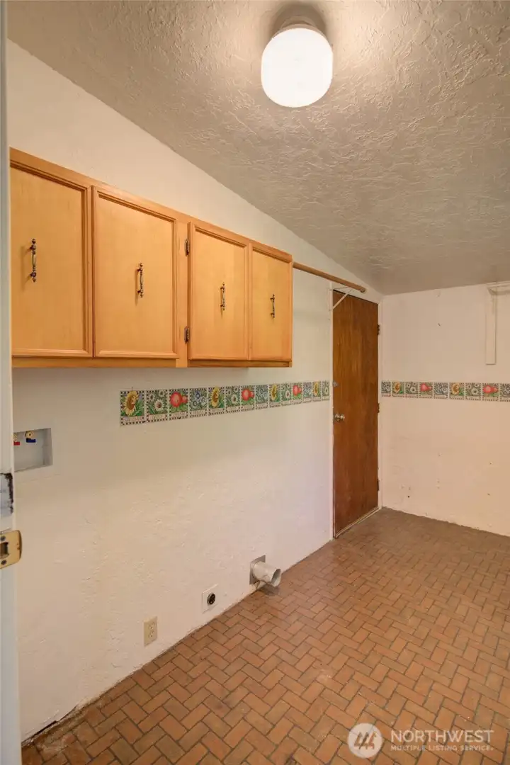 Plenty of room to add a second fridge/freezer or to store your beach toys. The door leads directly to the carport, so ideal as a mud room after spending the day at the beach.