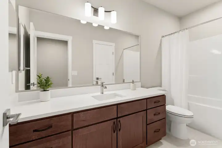 Home is under construction. Photos of a previously built home with similar finishes that are virtually staged. Builder reserves the right to make changes to plans & specifications without notice. Features vary by plan. Buyer to verify square footage.