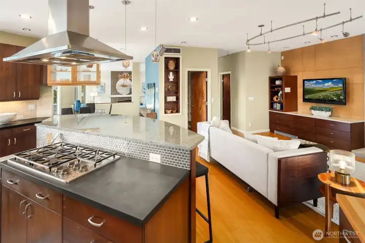 Don't miss the walk-in pantry, custom built-in shelving with warm wood finishes yet a light and bright interior
