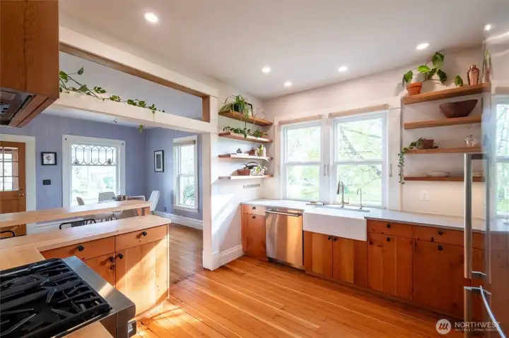 Kitchen remodel features custom cabinets from Carpenter Ant, using reclaimed wood from a barn in Custer.
