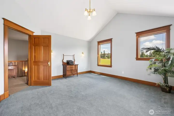 Upstairs bedroom #2 at front of home with Mt. Rainier and valley views.