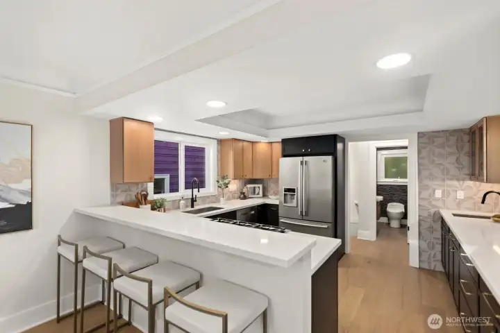 Kitchen with updated cabinetry and counter