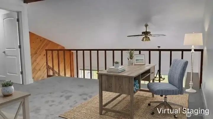 Open loft space overlooking the main living area, ideal for a home office, bonus room, or additional guest space.