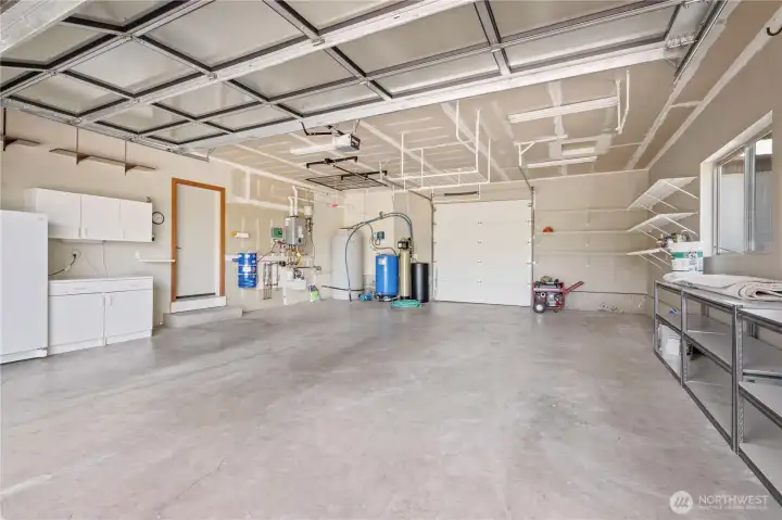 Attached 2 car garage with abundance of storage.