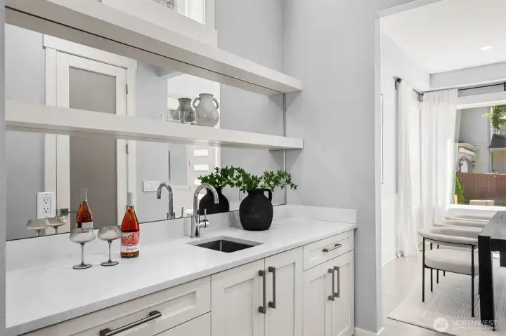 The stylish wet bar is perfectly suited for everything from morning coffee to evening cocktails.