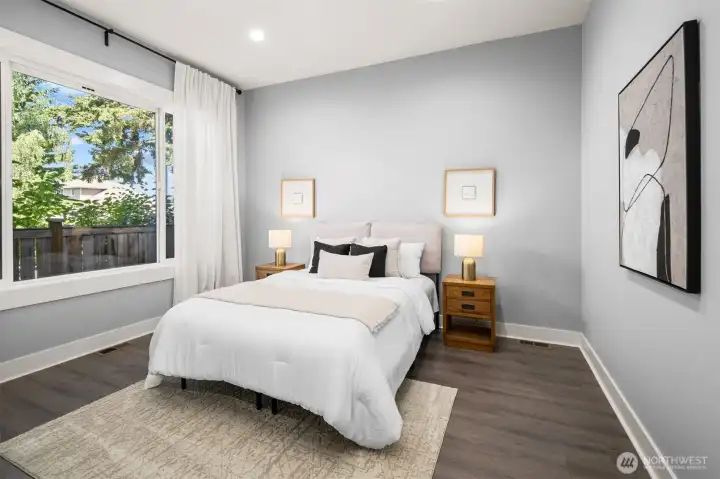 A versatile main-floor room offers the perfect space for multigenerational living, a private guest suite, activity/fitness room or a home office.