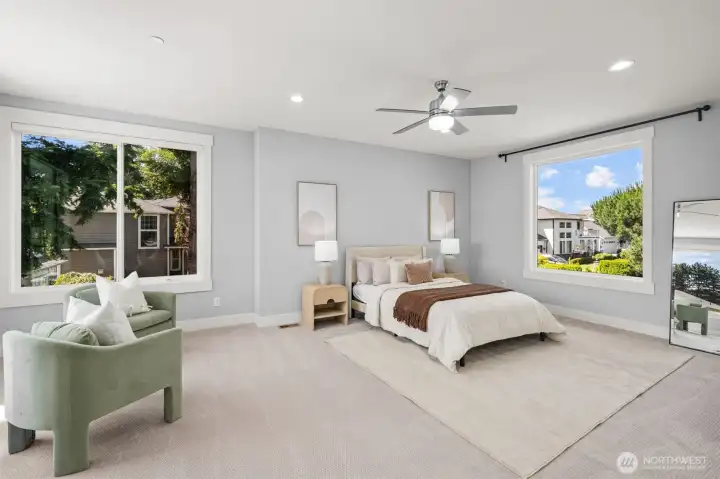 A well-appointed secondary primary suite provides the luxury of an attached bath and private deck for added comfort and convenience.