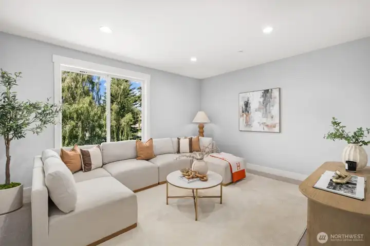 An expansive bonus room is ideal for hanging out, game nights, or creating your own home theater experience.