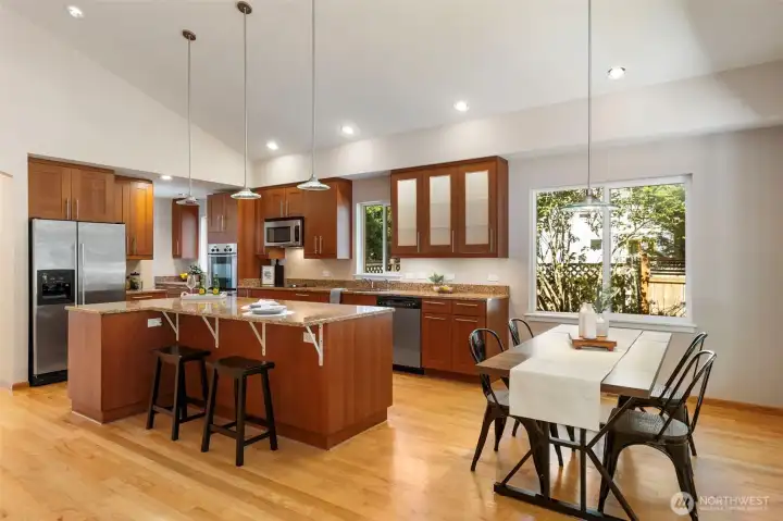 Kitchen with eat up counter and breakfast dining area