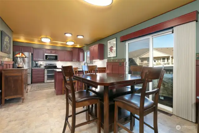 Spacious Eating Area Off Kitchen - Direct Access to Back Deck