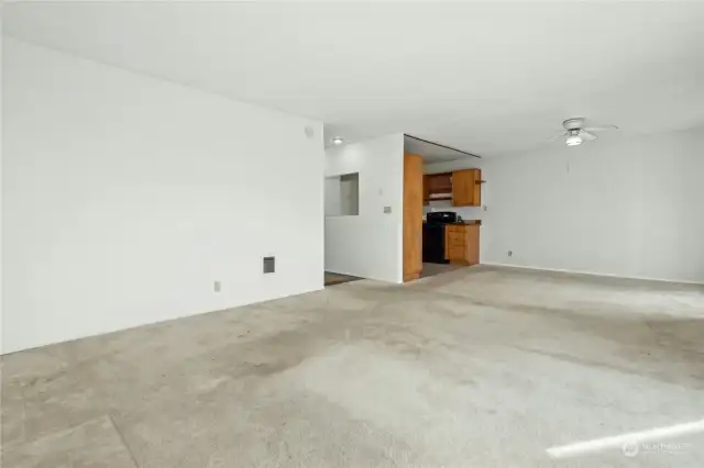 Living room opens to kitchen