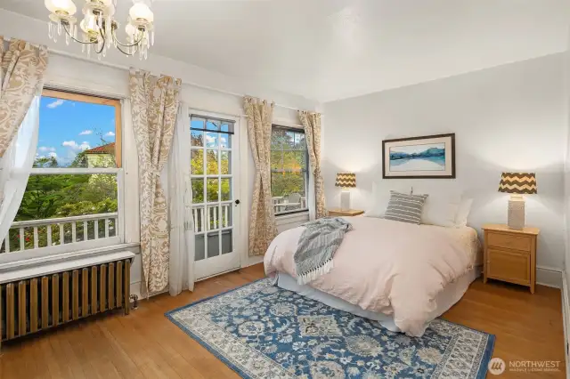 Third bedroom facing southeast. Access provided to the upper deck and big views.